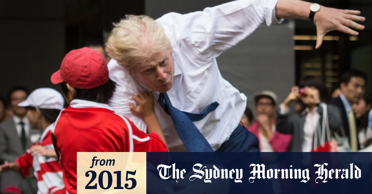 London mayor Boris Johnson tackles 10yearold Japanese boy during touch game